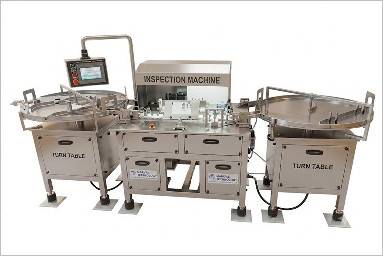 Industrial inspection machine with two circular turntables on the sides and a central control unit labeled 'Inspection Machine'