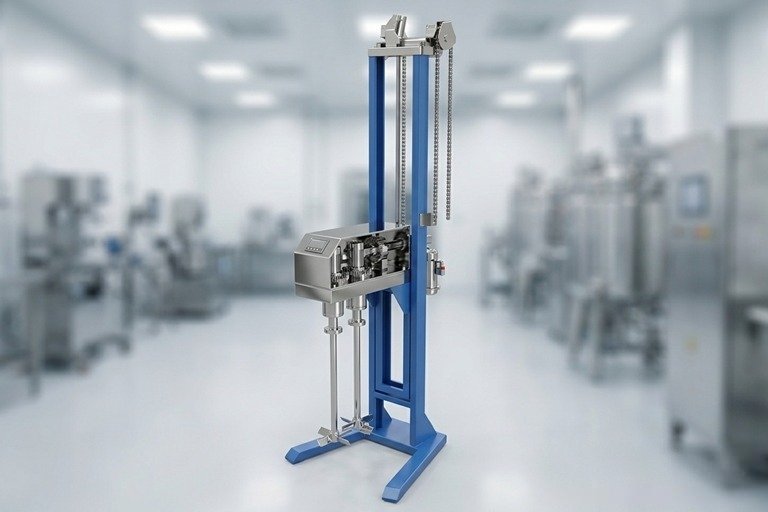 Vertical loading test stand on a blue frame with a metal actuator, in a bright lab environment