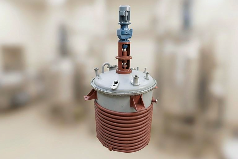 Industrial processing vessel with a motor on top, featuring a cylindrical tank wrapped in red cooling coils in an industrial setting