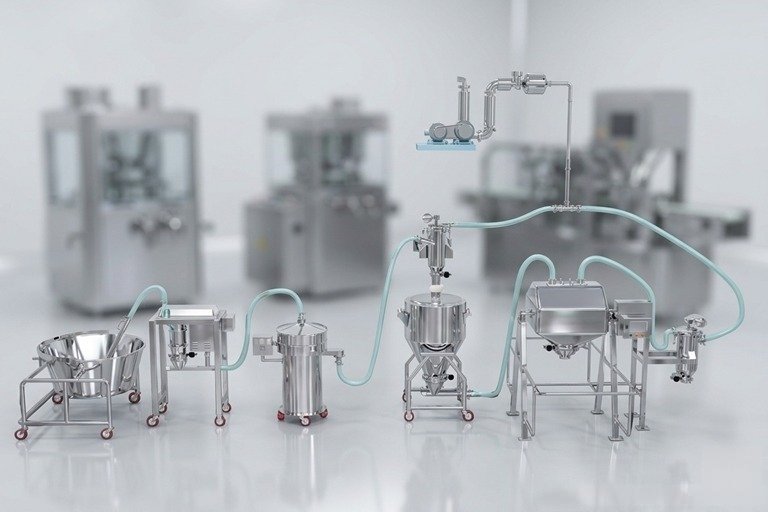 Industrial pharmaceutical processing line with stainless steel vessels, hoses, and a mixer in a clean-room setting