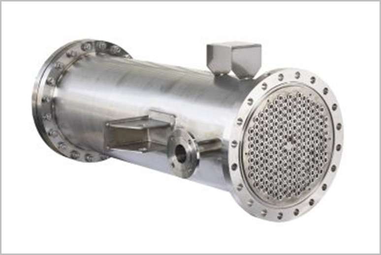 Stainless steel shell-and-tube heat exchanger with flanged ends and perforated end cap for fluid flow control.