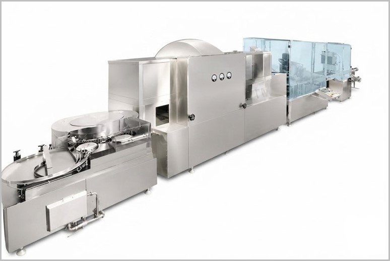 Stainless steel industrial processing line with multiple connected modules and control panels